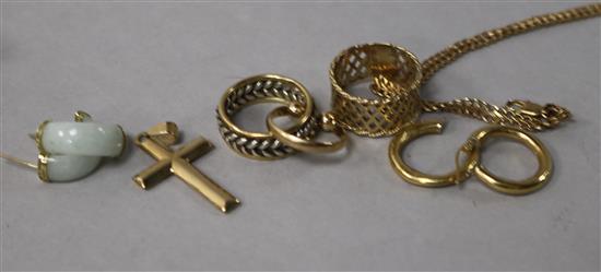 A 9ct gold bracelet, a 9ct gold cross pendant, a pair of 18ct gold earrings, one other pair or earring and three rings.